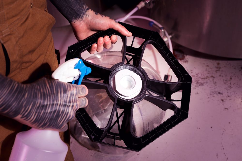 man-with-tattoos-producing-craft-beer